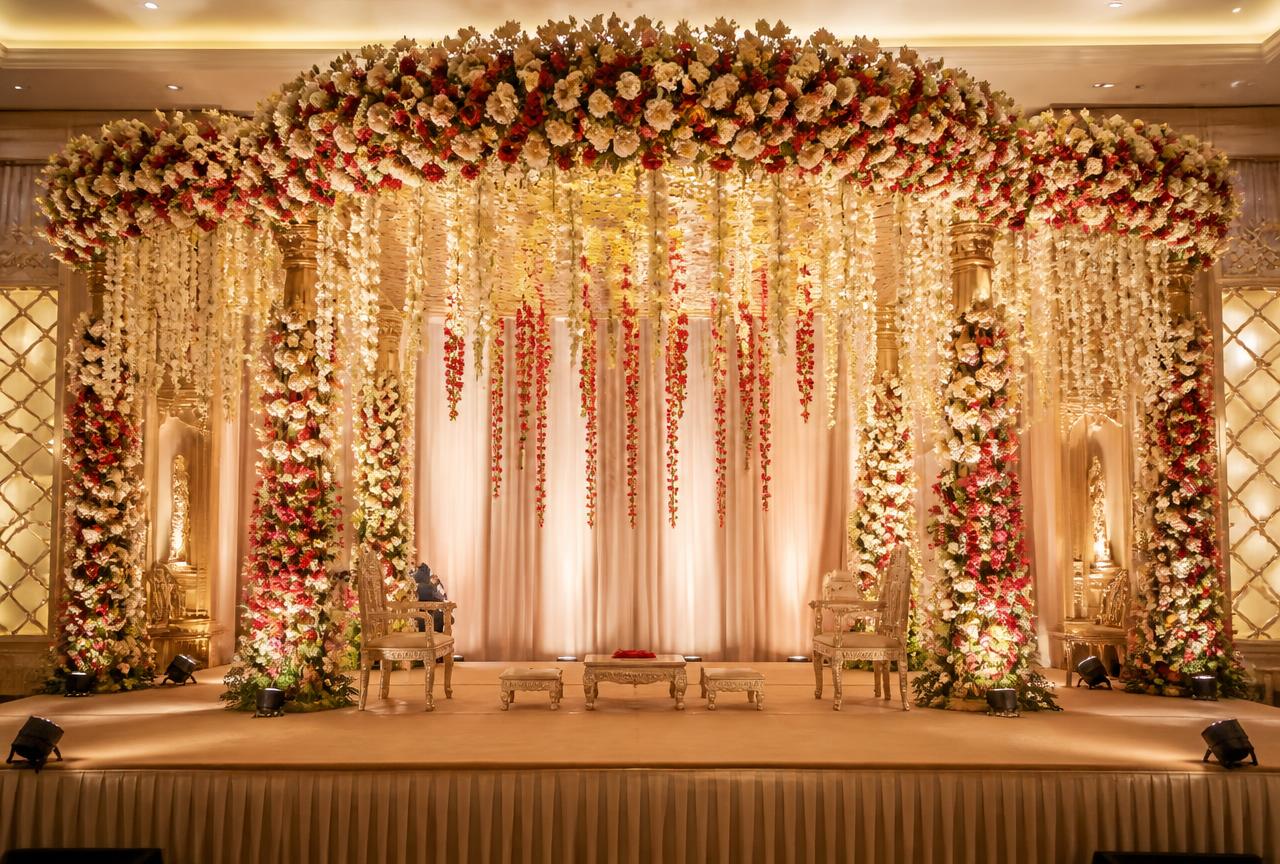 Wedding reception stage with floral decoration in Noida